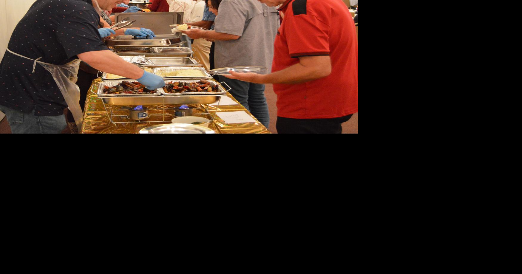 Community members give thanks together