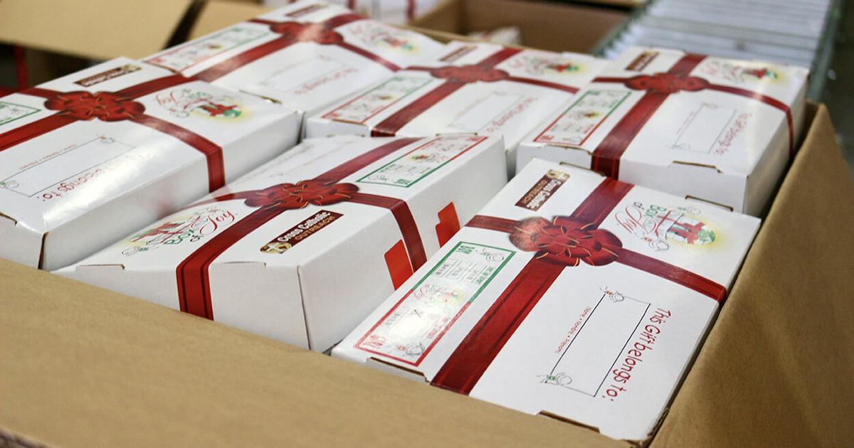 Colonel Fill Box Columbus teens fill Boxes of Joy | Miami | thefloridacatholic.org
