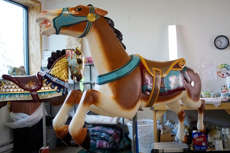 Horses, tiger for Canalside carousel get finishing touches