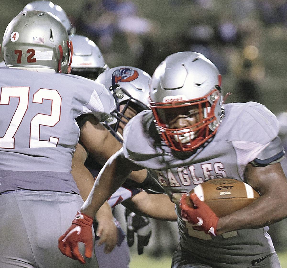 Lee, Eagles rush to first win of fall campaign, 48-19