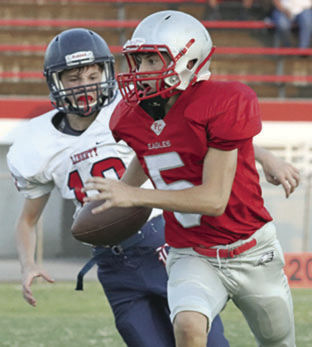HIGH SCHOOL FOOTBALL: Eagles jayvees pound Liberty, 58-0
