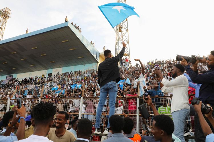 Fans welcome Somali referee Artan, who was expected to officiate at matches during the 2026 FIFA World Cup but was denied entry to U.S., in Mogadishu