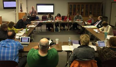 New salary structure  would give teachers  $784 yearly increase