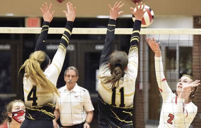 EAGLES WIN VOLLEYBALL OPENER