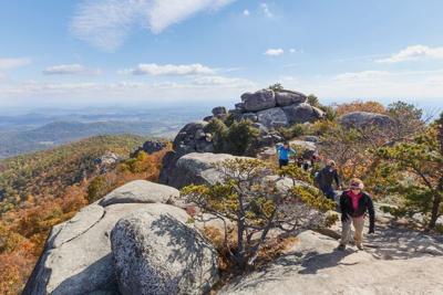 Hikers on the Ridge Trail at Old Rag Mountain in Shenandoah National Park, Virginia.