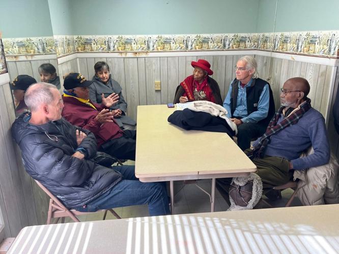 Sculptors Paul DiPasquale (second from right) and Rick Weaver (left) (copy)