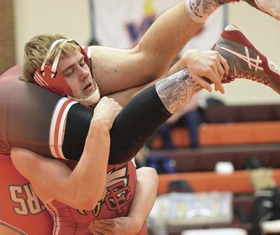 Church changes mat plans, will compete for Panthers