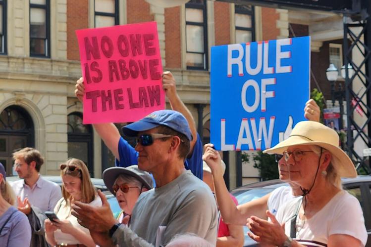 A crowd of people gathers at an event in Wooster, Ohio during the Justice in Motion bus tour.