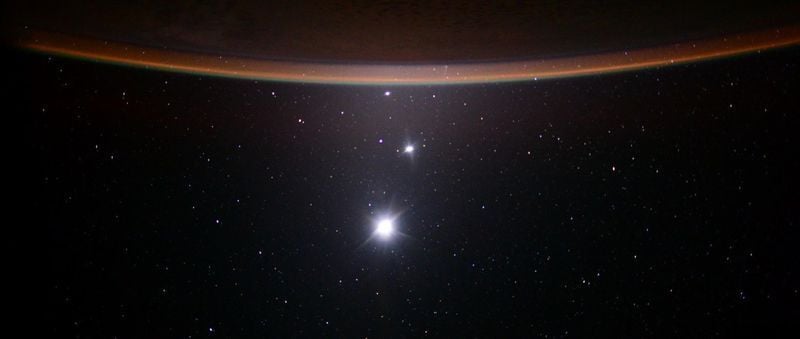 Earth, Jupiter, Venus photographed from the International Space Station.