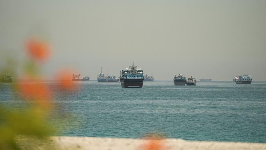 Vessels sail through the Strait of Hormuz