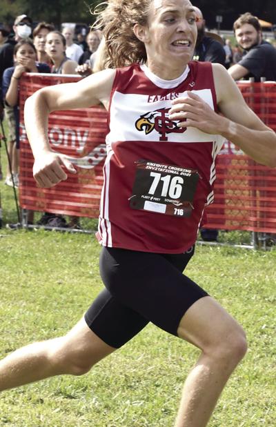 Atchue claims fourth state title, first in cross country