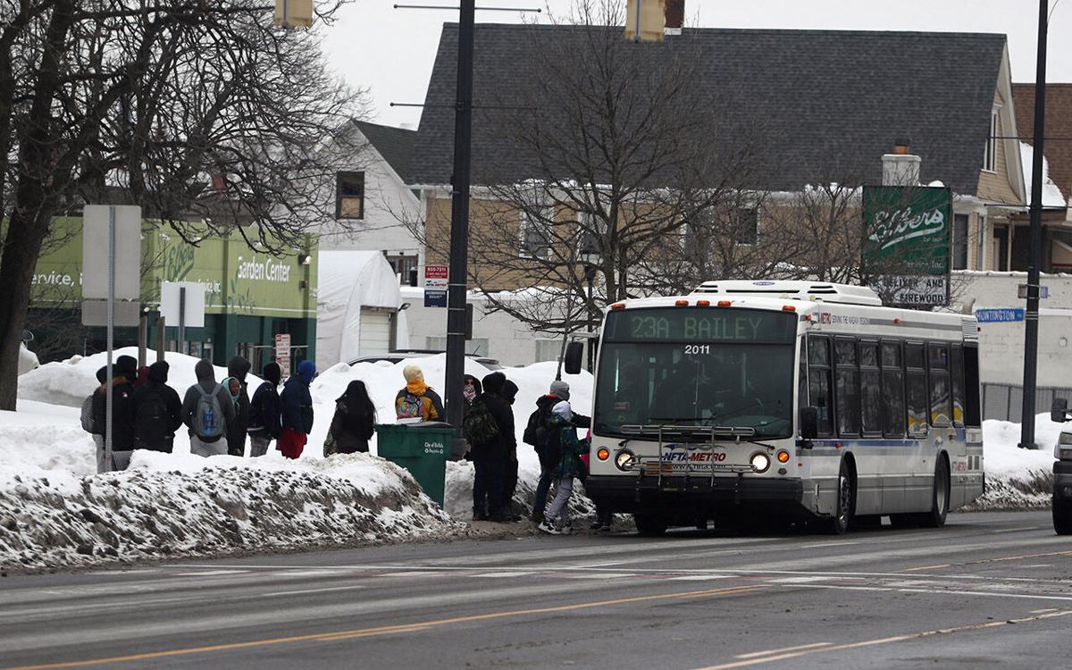 Kids getting on NFTA bus