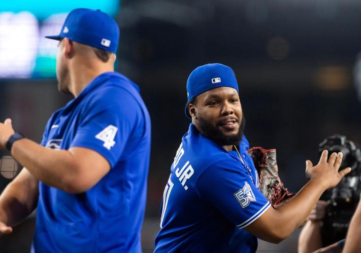 George Springer and Vladimir Guerrero Jr. after a win in Arizona.