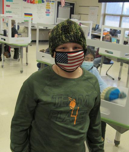 Students receive winter hats from Adele's Legacy