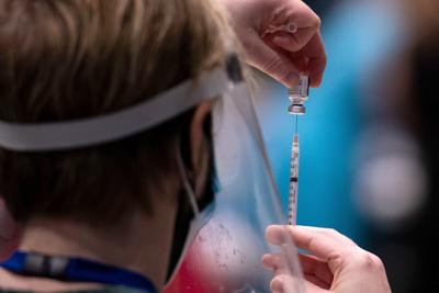 'Healthy, young' Americans will likely get Covid-19 vaccine in mid- to late summer, expert says