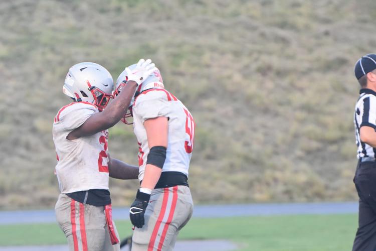 Middle quarters scoring surge propels Eagles in opener