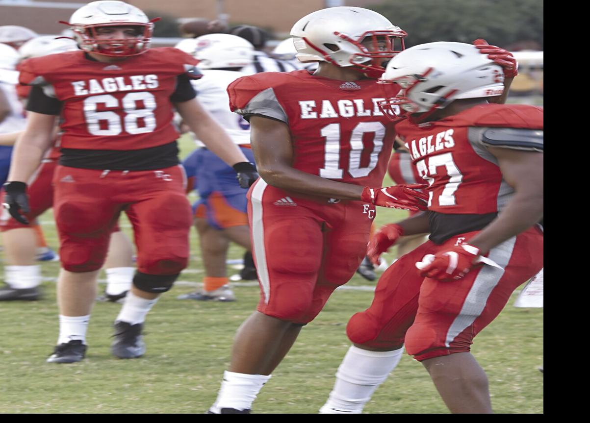 Scoring surges propel Bengals, 42-25