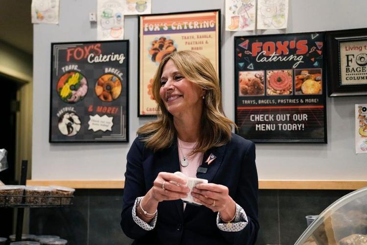 Democratic gubernatorial candidate Dr. Amy Acton reacts after ordering bagels at Fox's Bagel and Deli on Oct. 6, 2026 in Columbus, Ohio.