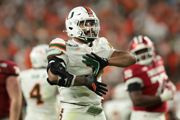 Jan 19, 2026; Miami Gardens, FL, USA; Miami Hurricanes defensive lineman Akheem Mesidor (3) celebrates after a sack against the Indiana Hoosiers in the third quarter during the College Football Playoff National Championship game at Hard Rock Stadium.