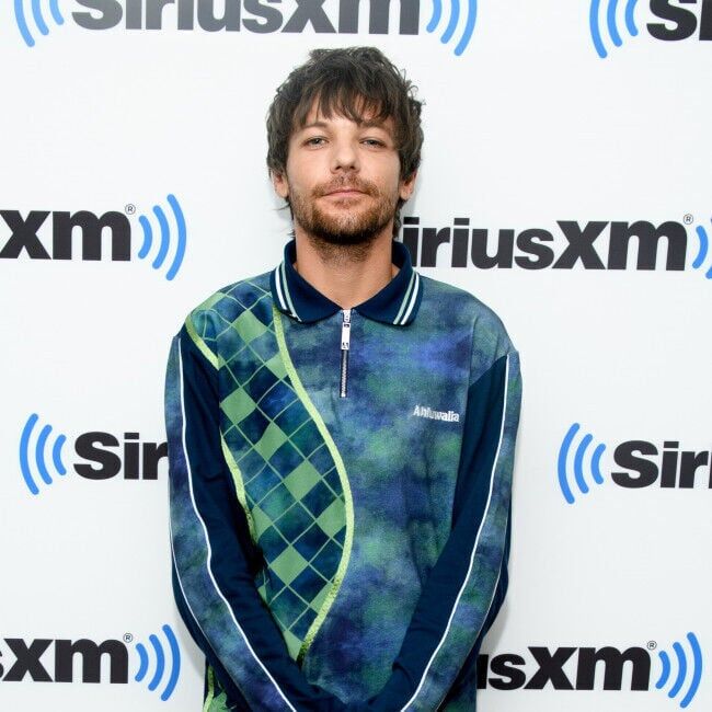 Louis Tomlinson shocked by UK number one album