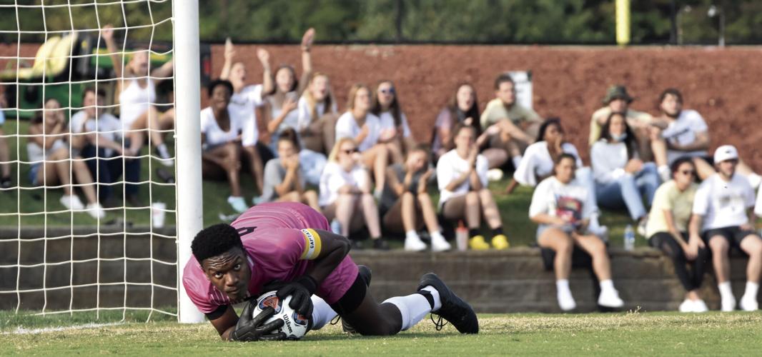 Panthers honor fallen teammate with OT triumph