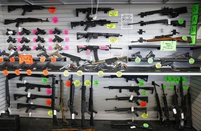 US-NEWS-BIDEN-MEDICAID-FIREARMS-DA