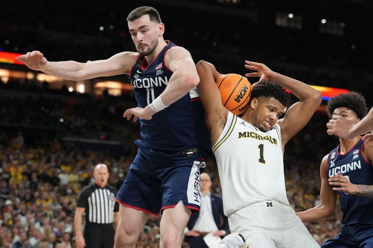NCAA UConn Michigan Basketball