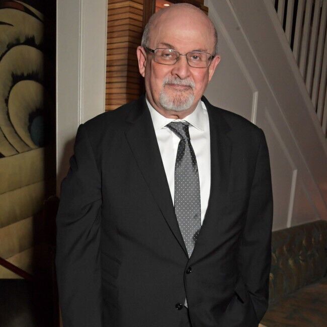 Salman Rushdie is in surgery after being stabbed at least 15 times from behind