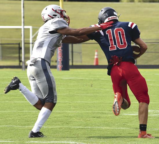 FIRST VARSITY SCRIMMAGES