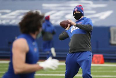 Allen warms up his arm