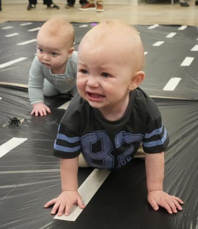 Acme Fresh Market in North Canton, Ohio, hosted a Diaper Derby where babies crawl their way to free diapers and wipes provided by Acme and Huggies on Dec. 10, 2025.