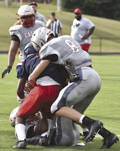 FIRST VARSITY SCRIMMAGES