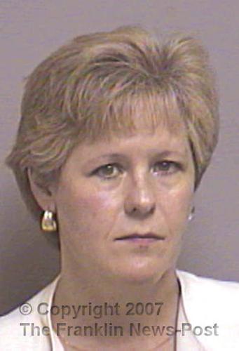 Woman to serve 2 years for fraud, embezzlement