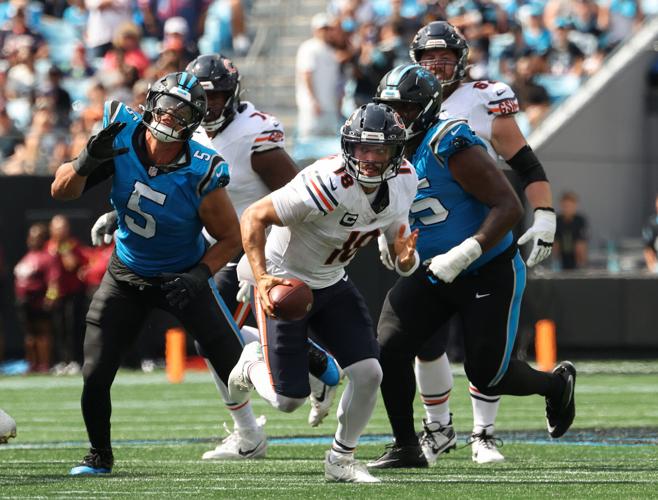 Chicago Bears quarterback Caleb Williams breaks free for a rushing touchdown in the second quarter against the Carolina Panthers at Bank of America Stadium on Sunday, Sept. 13, 2026, in Charlotte, N.C..