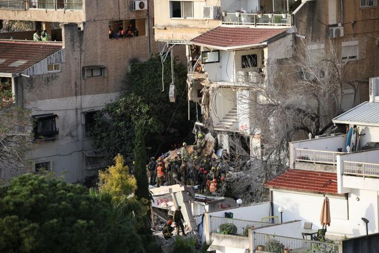 Aftermath of a projectile impact in Haifa