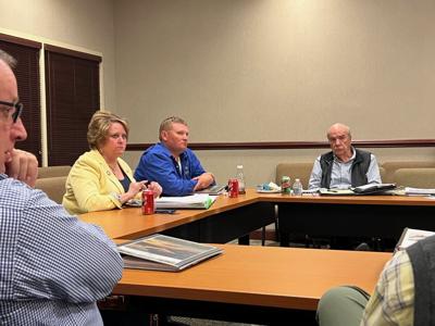 Franklin County Board of Supervisors members Lorie Smith (from left), Nick Mitchell and Marshall Jamison