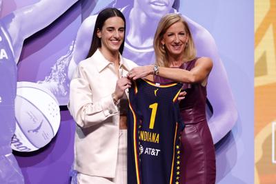 Caitlin Clark poses with WNBA Commissioner Cathy Engelbert -ONE-TIME USE