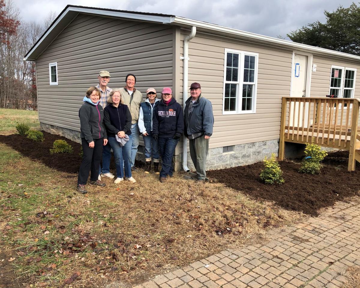Volunteers help make a house a home with landscaping