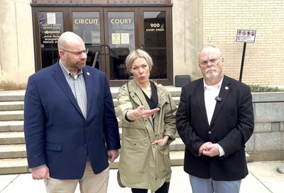 Members of Lynchburg City Council speak outside circuit courthouse