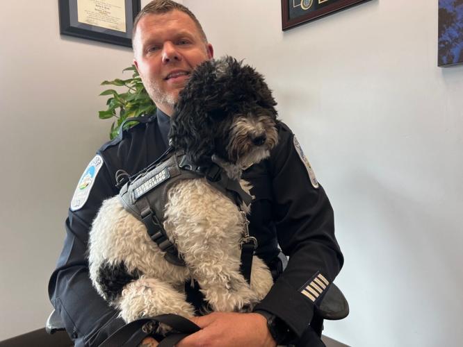 Rocky Mount Police Department Lt. S.E. Richardson with station dog Maggie