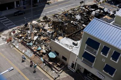 Three businesses are leveled on Wednesday, July 12, 2023 following a fire in the 2600 block of Atlantic Avenue in Virginia Beach, Va. on Tuesday.