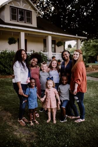 Shadese Griffith, left, and Whitney Gilbert, right, pose for a photo. The special "Our 2 Moms" was filmed in Statesville.