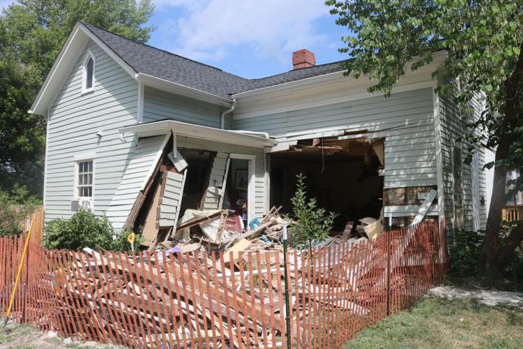 Pickup truck leaves house smashed