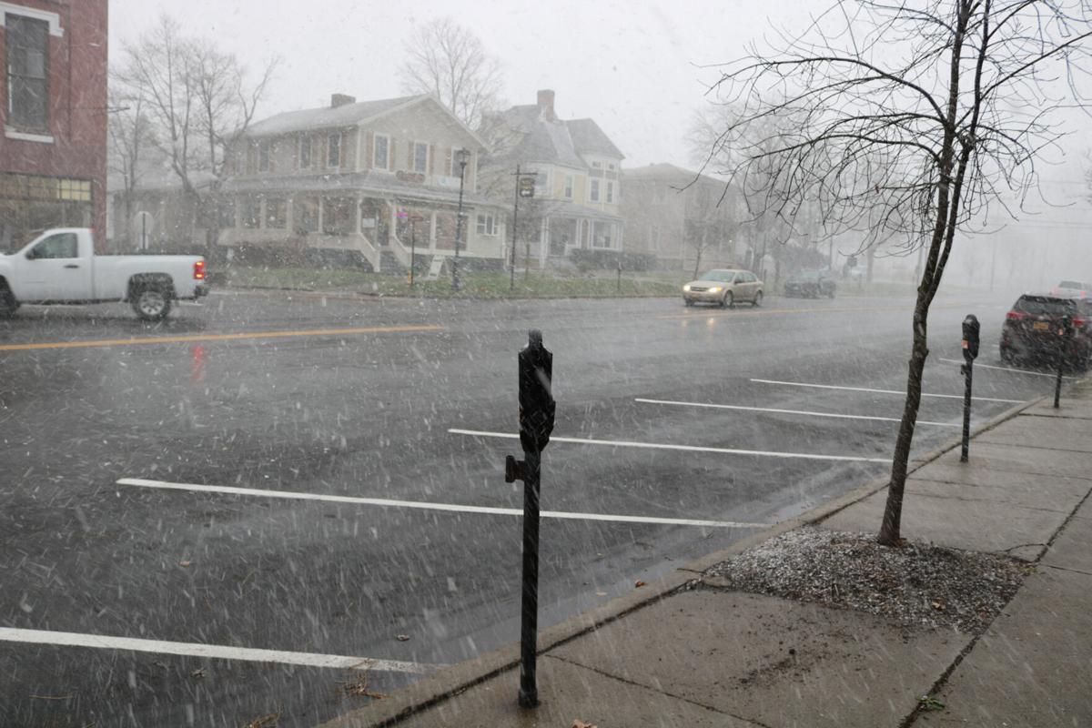 Weather Snow showers to continue into Wednesday before warmer weather