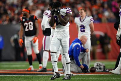 Buffalo safety Damar Hamlin collapses during game vs. Bengals, is in  critical condition, NFL says; game postponed indefinitely 