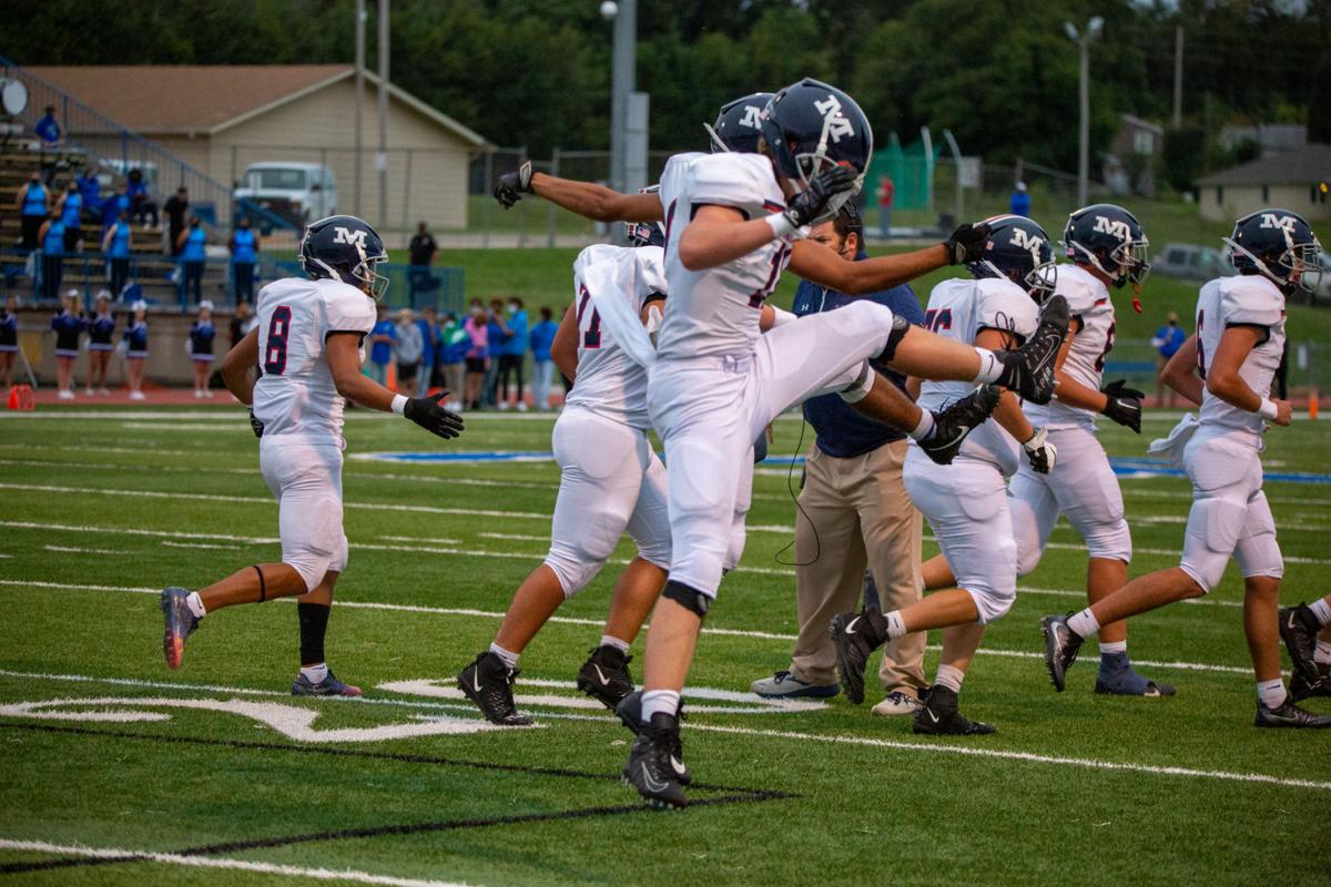 Manhattan high students celebrate after early touchdown. Manhattan High Indians went head to head against the Junction City Bluejays on Friday night at Al Simpler Stadium with a final score of Junction City 36, Manhattan 29.