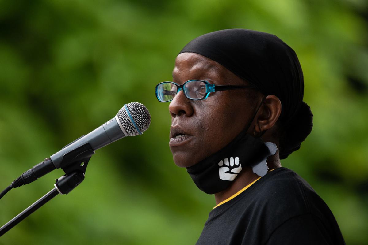 Teresa Parks speaks about personal experiences sheÕs had with racism before the Flashlight Vigil at Wefald Pavilion on Friday night. ÒYÕall, thereÕs no flat metric for you to be a good person other than you choosing to. ThatÕs the choice we all get to make,Ó said Parks.
