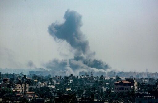 Smoke billows over the Hamad residential towers in Gaza's main southern city of Khan Yunis after an Israeli bombardment on Saturday