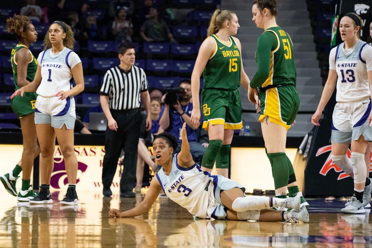 Angela Harris (3) looks at the referee for a foul to be called.