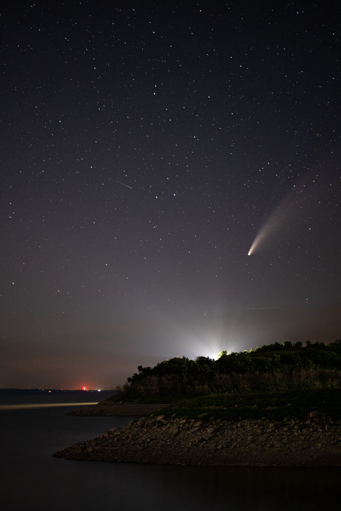 Comet NEOWISE or C/2020 F3 flies above Tuttle Creek Lake on Thursday evening at 10:45 p.m. The comet was first identified by the infrared-optimized NEOWISE spacecraft (short for Near-Earth Object Wide-field Infrared Space Explorer) on March 27, 2020 and will be visible to the naked eye until the end of July 2020. Comet NEOWISE can be found under the Big Dipper when looking in the Northwest direction. Comet NEOWISE is traveling at a speed of 17,500 miles per hour and won’t be visible for another 6,800 years.